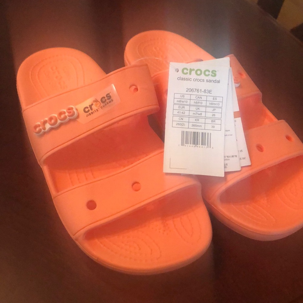 Brand new Classic Crocs Sandal in Papaya.
